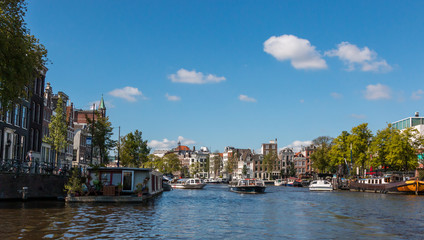 Fototapeta na wymiar A view along one of Amsterdam's canals in summer