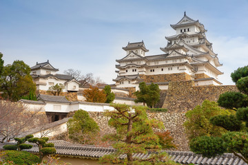 Obraz premium Himeji Castle in Kansai Area. One of the most famous and beautiful old castles in Japan. Spectacular view from outside the castle walls.