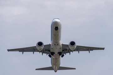 Sunny view of airplane taking off from airport of Tivat, Montenegro.