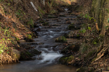 Hucivy creek in Perstejn village in winter morning