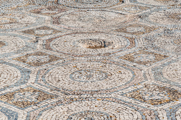 abstract background of an ancient paved mosaic road