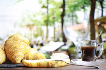 Fresh pastries on the table. French flavored croissant.