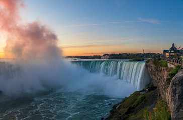 Niagara Falls is a group of three waterfalls at the southern end of Niagara Gorge, between the Canadian province of Ontario and the US state of New York
