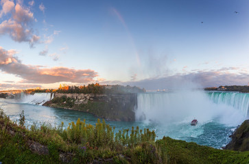 Naklejka na ściany i meble Niagara Falls is a group of three waterfalls at the southern end of Niagara Gorge, between the Canadian province of Ontario and the US state of New York