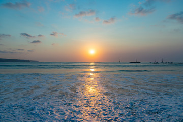 Beautiful sunset scenery at Jimbaran beach, Bali island, Indonesia.