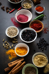 Different spices in small bowls, food close-up