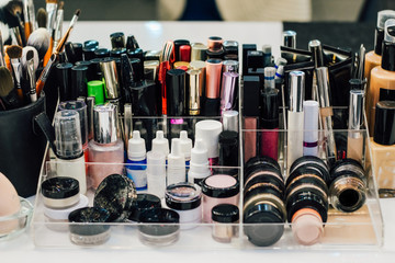 Fototapeta na wymiar Cosmetic products on the table by a professional makeup artist in the salon