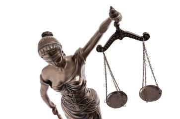 Lady Justice statue is the Greek ancient goddess Themis a symbol of justice isolated on white