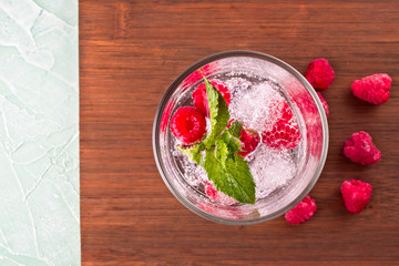Water detox with fresh raspberries and mint leaves - 308315713