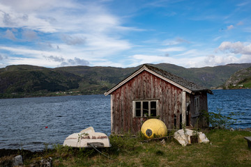 Fototapeta na wymiar house on the fjord