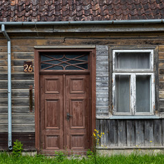 door and window in old wooden house