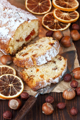 Traditional homemade Christmas cake sprinkled with sugar powder