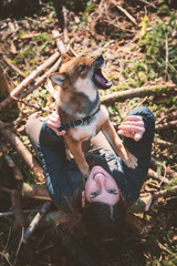 Walk in the forest with his puppy, autumn colours