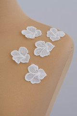 Texture flowers lace fabric. decor flowers on dummy, mannequin