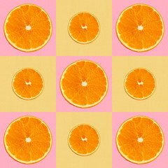 seamless texture of a set with juicy slices of orange staggered for menu or recipe, concept of vegetarian, vitamin and wholesome food, background, pattern for textile, wallpaper