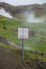 Warning sign about temperature of hot springs in Iceland