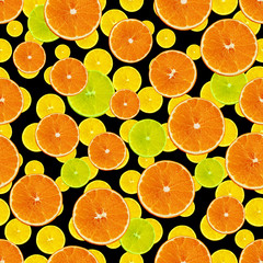 set seamless texture with juicy slices of orange, lemon, lime on a black background for menu or recipe, concept of vegetarian, vitamin and healthy food, background, pattern for textile, wallpaper