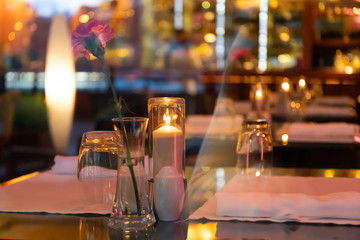 Street view to the restaurant`s table through the window