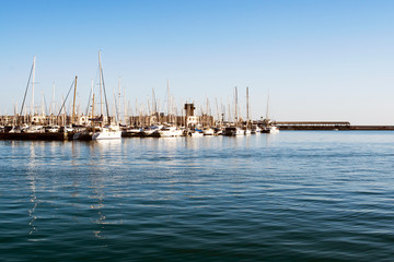 city ​​port with pleasure boats on the horizon