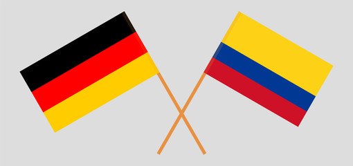 Crossed flags of Colombia and Germany