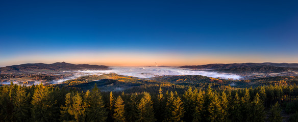 Sunrise over Liberec, view from viewpoint Cisarsky kamen, Jested mountain, Czech Republic
