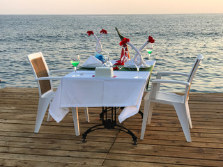 Diner on sea before sunset