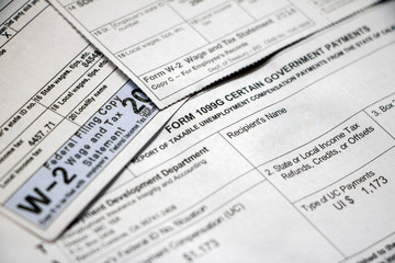 Closeup of 1099G and W-2 tax forms