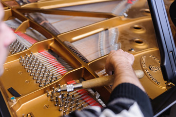 Piano tuning sound before jazz concert