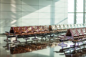 Empty chairs in the departure hall at airport