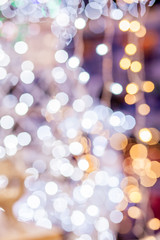 Festive blur background. Abstract twinkled bright background with bokeh defocused golden lights