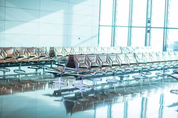 Empty chairs in the departure hall at airport