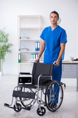 Young male doctor working in the clinic