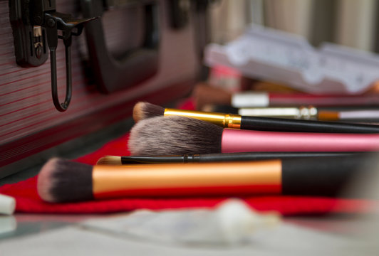 Makeup Artist Brushes And Kit Backstage Closeup On Table