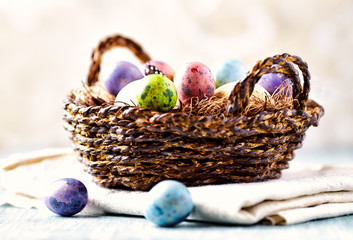 Basket of Colorful Quail Eggs for Easter