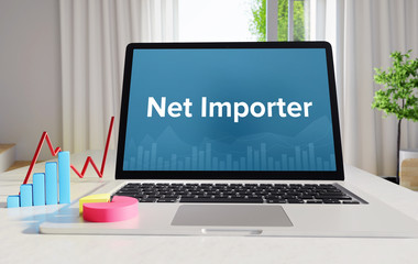 Net Importer – Statistics/Business. Laptop in the office with term on the Screen. Finance/Economy.
