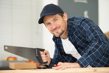 a man with carpentry tools
