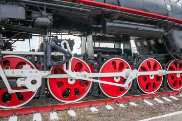 wheels of an ancient locomotive close-up, retro vehicle