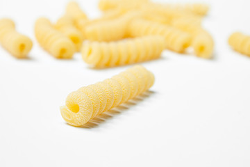 pasta from durum wheat curls fusilli, cavatappi, unprepared, raw pasta cellentani handmade isolated on white background close up macro