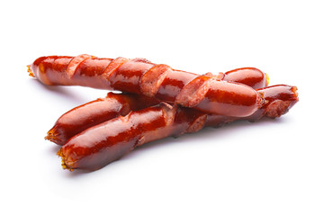 Tasty grilled sausages on white background