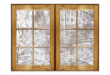 Wooden frame with a winter landscape outside the window. Isolated on white background
