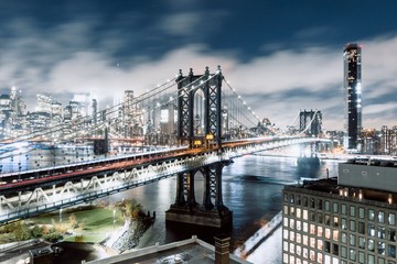 Illuminated Manhattan Bridge captured at night in New York, United States