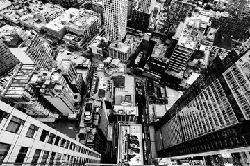 Aerial grey scale shot of the buildings and streets in New York City, United States