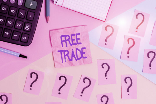 Handwriting text Free Trade. Conceptual photo international trade left to its natural course without tariffs Mathematics stuff and writing equipment above pastel colours background