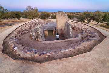 Visitor at burial chamber of Dolmen of Lacara, Spain