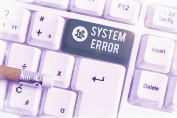 Handwriting text writing System Error. Conceptual photo instruction that is not recognized by an operating system White pc keyboard with empty note paper above white background key copy space