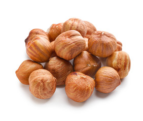 Tasty hazelnuts on white background