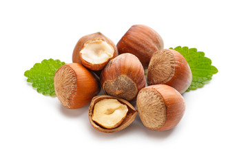 Tasty hazelnuts on white background