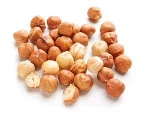 Tasty hazelnuts on white background