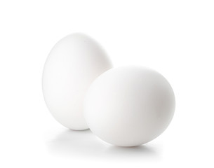 Fresh raw eggs on white background