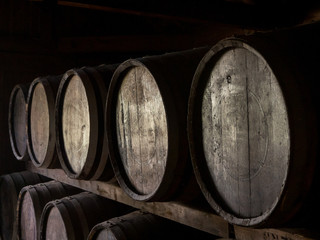 Wooden barrels in a warehouse of a whiskey distillery in Hokkaido, Japan